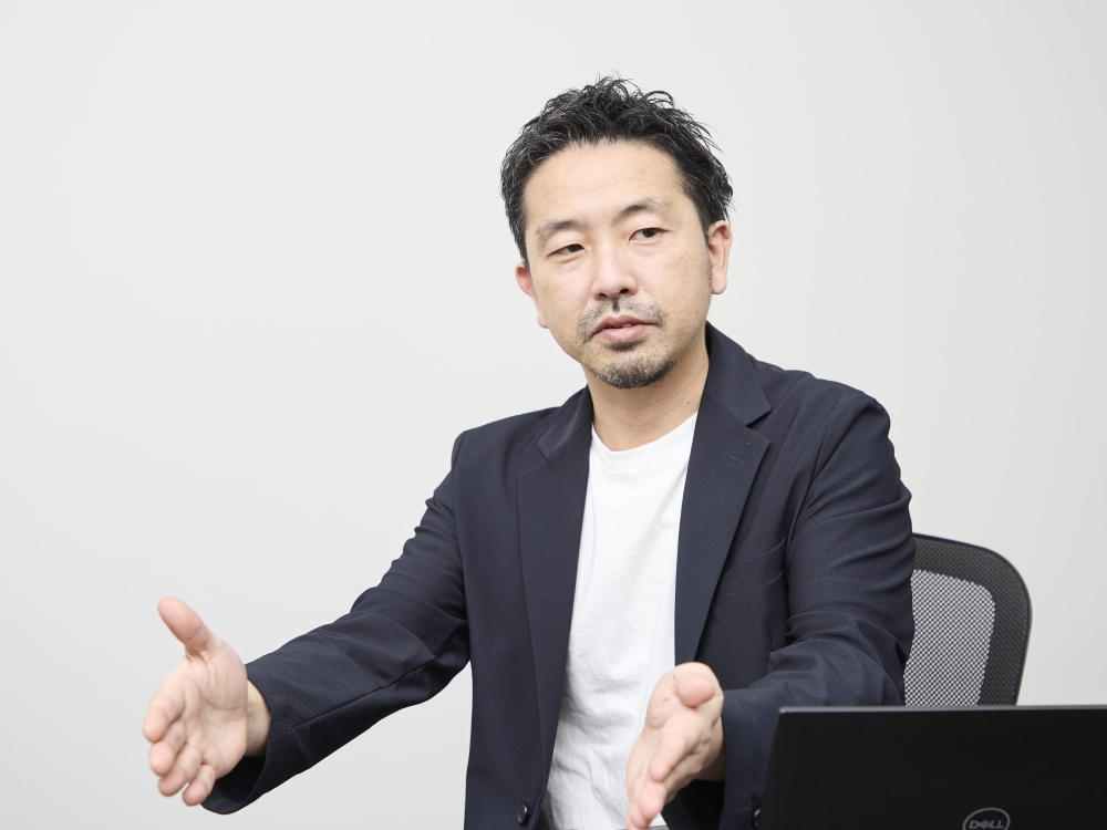 完全に機械に任せる自動化ではなく、「重要なのは人の手と機械の両方が介在することで高い汎用性を持たせること」と話す小椋氏